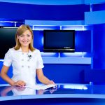 television anchorwoman at TV studio