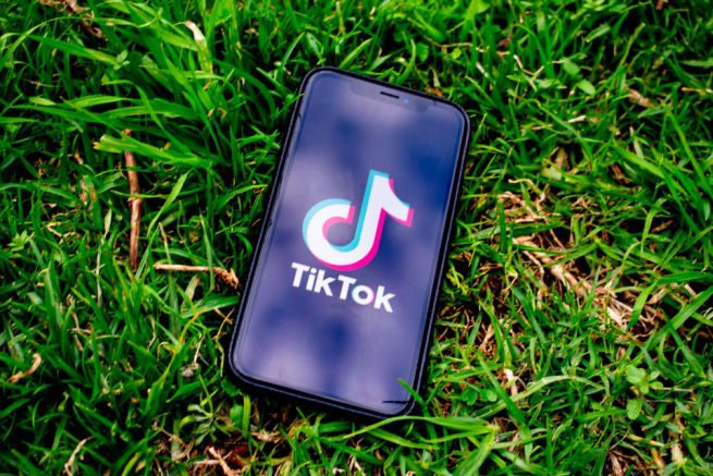 TikTok logo on phone screen